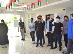 GR-12-Boys giving donation at Sharjah City for HumanitarianServices